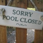 pool-closed sign on door